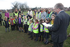 The Right Worshipful Deputy Mayor of the City and District of St Albans, Councillor Jamie Day, at the opening with pupils from Cunningham Hill Infant School.