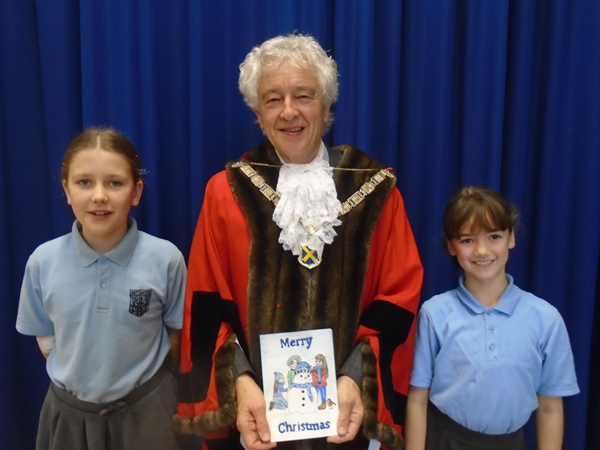 The Mayor, Cllr Anthony Rowlands, with the Skyswood School pupils who designed his Christmas card