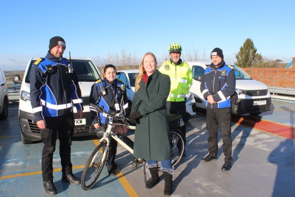 Cllr Helen Campbell, centre, Chair of the Public Realm Committee, with Parking Services staff