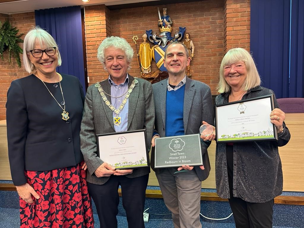 The Mayor, 2nd left, and Mayoress, Annie Stevenson, left, congratulate Pat Schofield, far right, and Redbourn In Bloom Chair, Meirion Anderson