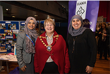 At the Hertfordshire Asian Women’s Association (HAWA) stall: The Mayor of the City and District of St Albans, Cllr Rosemary Farmer with members of HAWA