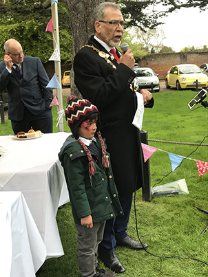 The Mayor of the City and District of St Albans, Councillor Mohammad Iqbal Zia, speaking at the tea party. The Mayor is pictured with his grandson