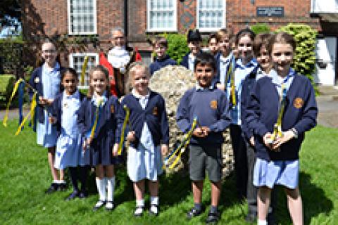 The Mayor of the City and District of St Albans, Councillor Mohammad Iqbal Zia, pictured with pupils from St Michael’s Primary School at the Pudding Stone.