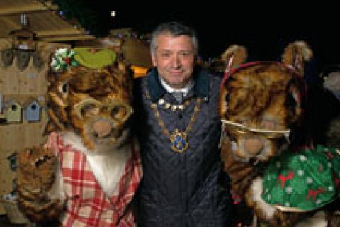 St Albans Mayor, Cllr Salih Gaygusuz, at the Christmas Market with the Christmas Nutkins 