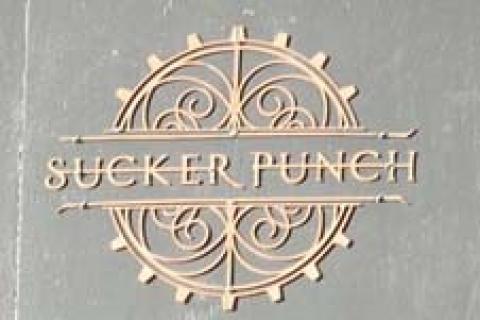Sucker punch logo on wall