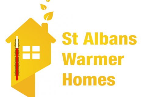 Warmer Homes logo