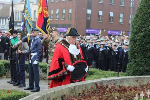 The Mayor, Cllr Geoff Harrison, laying a wreath