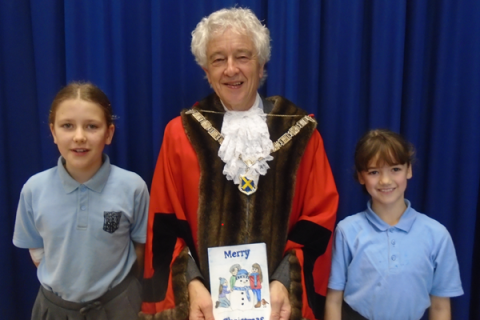 The Mayor, Cllr Anthony Rowlands, with the Skyswood School pupils who designed his Christmas card