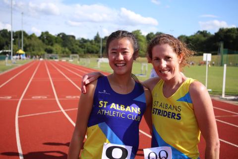 Team mates Lily Tse (left) and Kate Dixon compete at the Abbey View Community Athletics Track